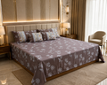 dark grey/charcoal leaf-pattern bedsheet